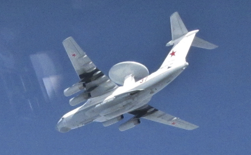 Illustration for article titled Photos of NATO fighters intercepting fully armed Russian jets
